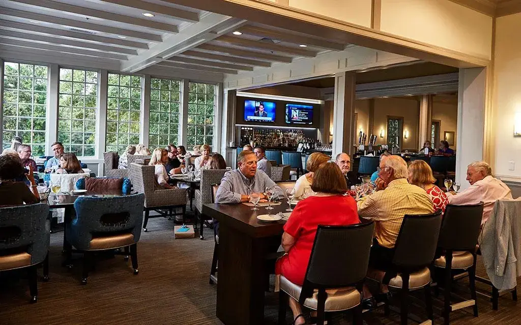 Banquet room prepared for an event at Ford's Colony Country Club
