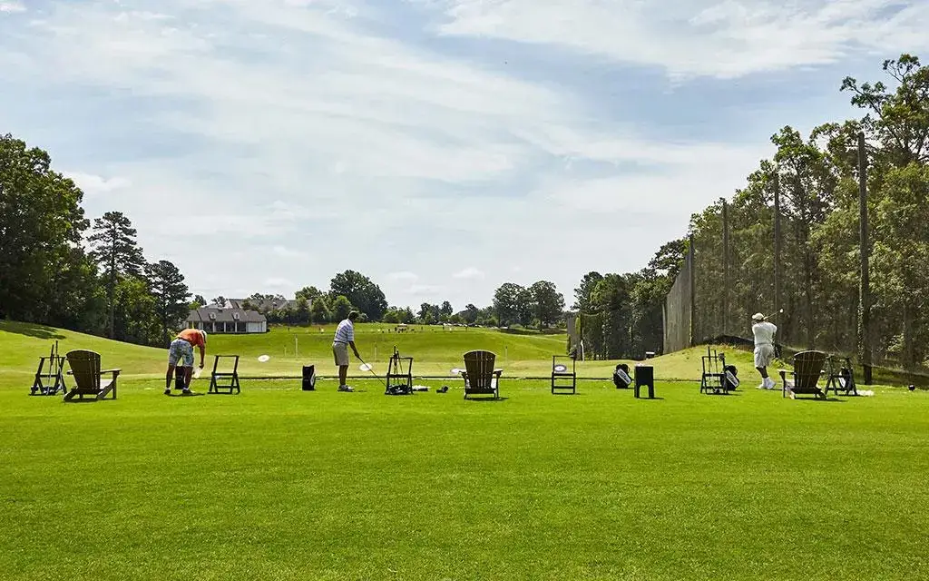 Golfers practicing at Ford's Colony